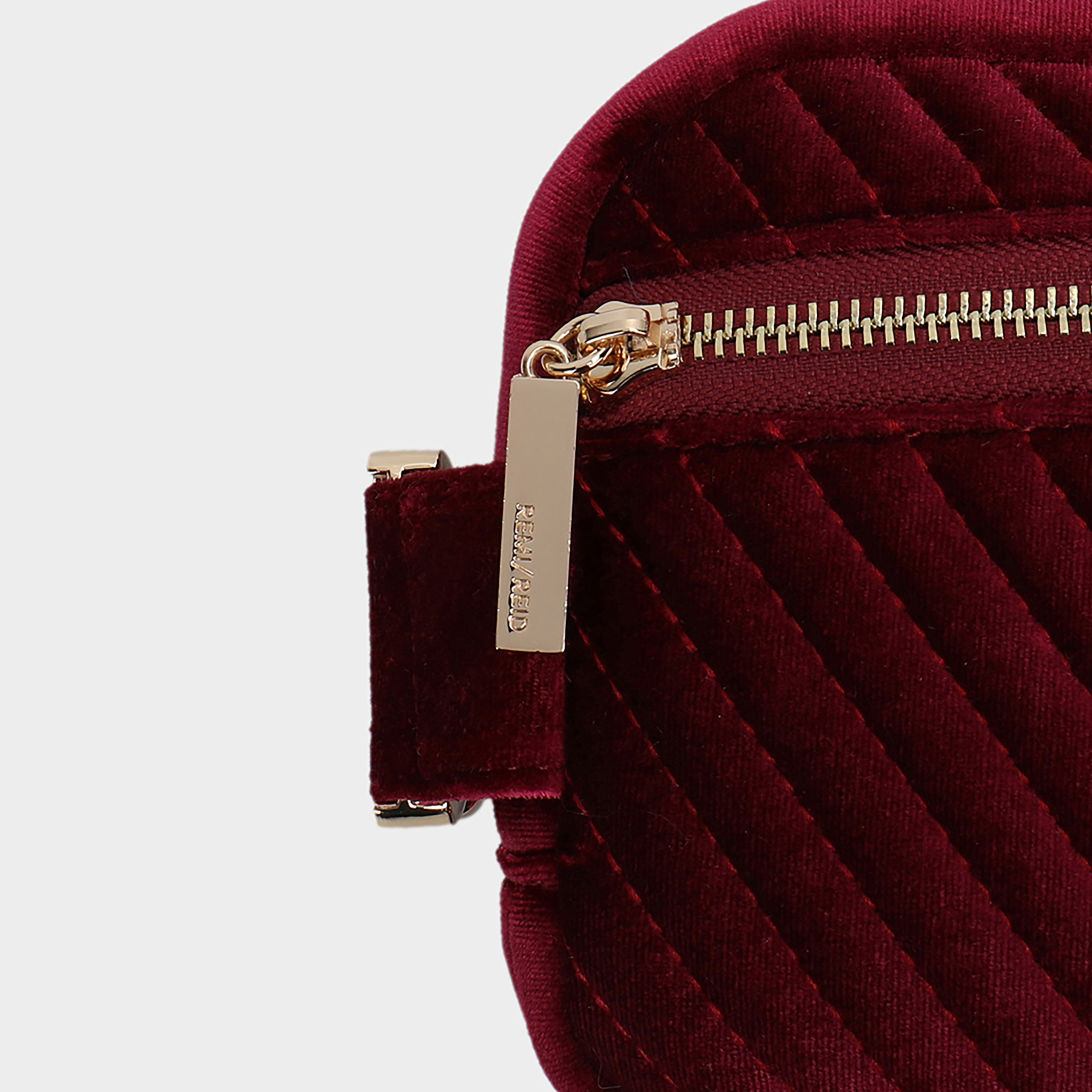 AERIN VELVET QUILTED BELT BAG BERRY