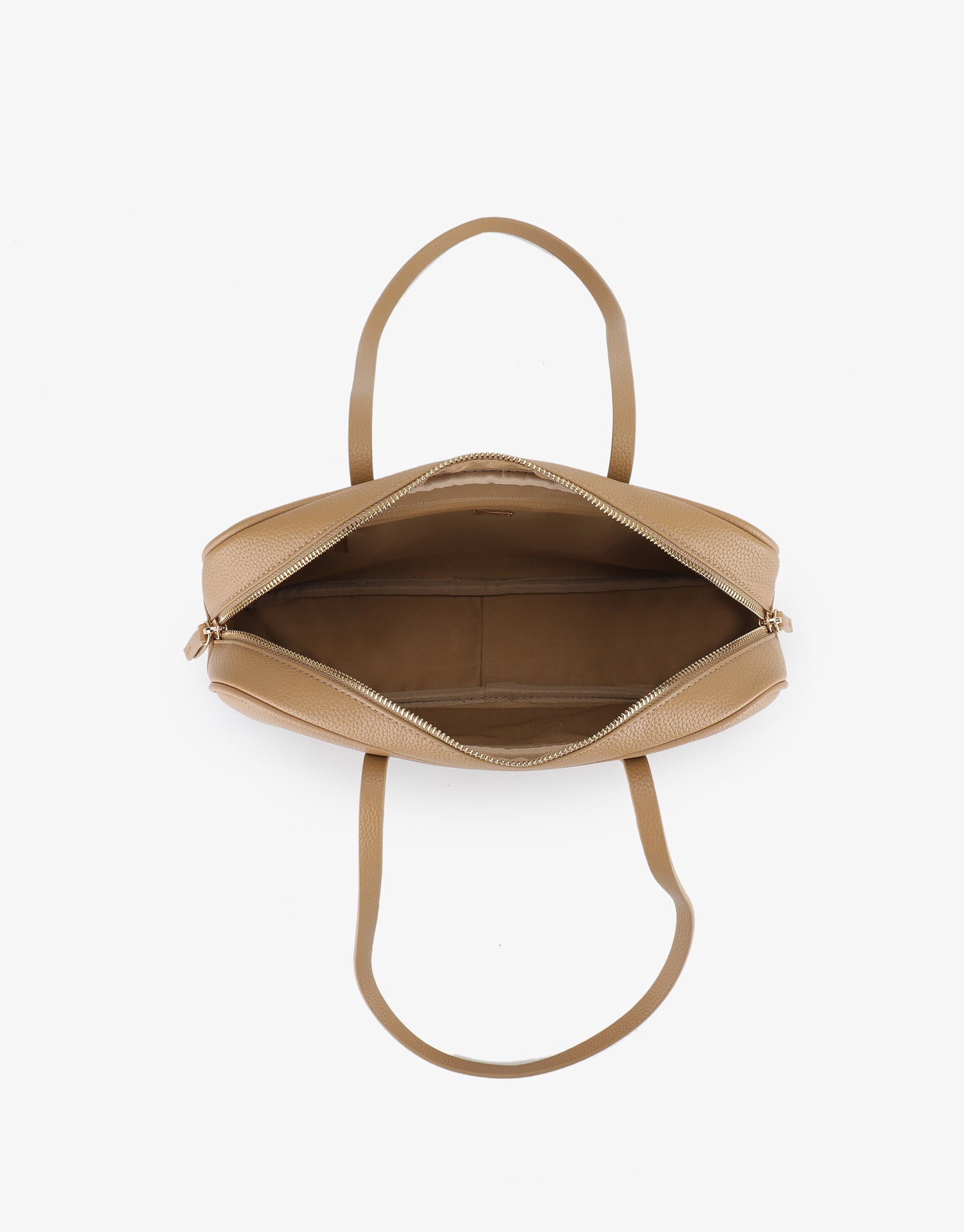 Interior top-down view of the light tan Alani East West Satchel by Remi and Reid showing a light tan fabric lining.