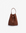 A brown faux suede mini bucket bag with a drawstring closure and a removable crossbody strap by Remi and Reid.