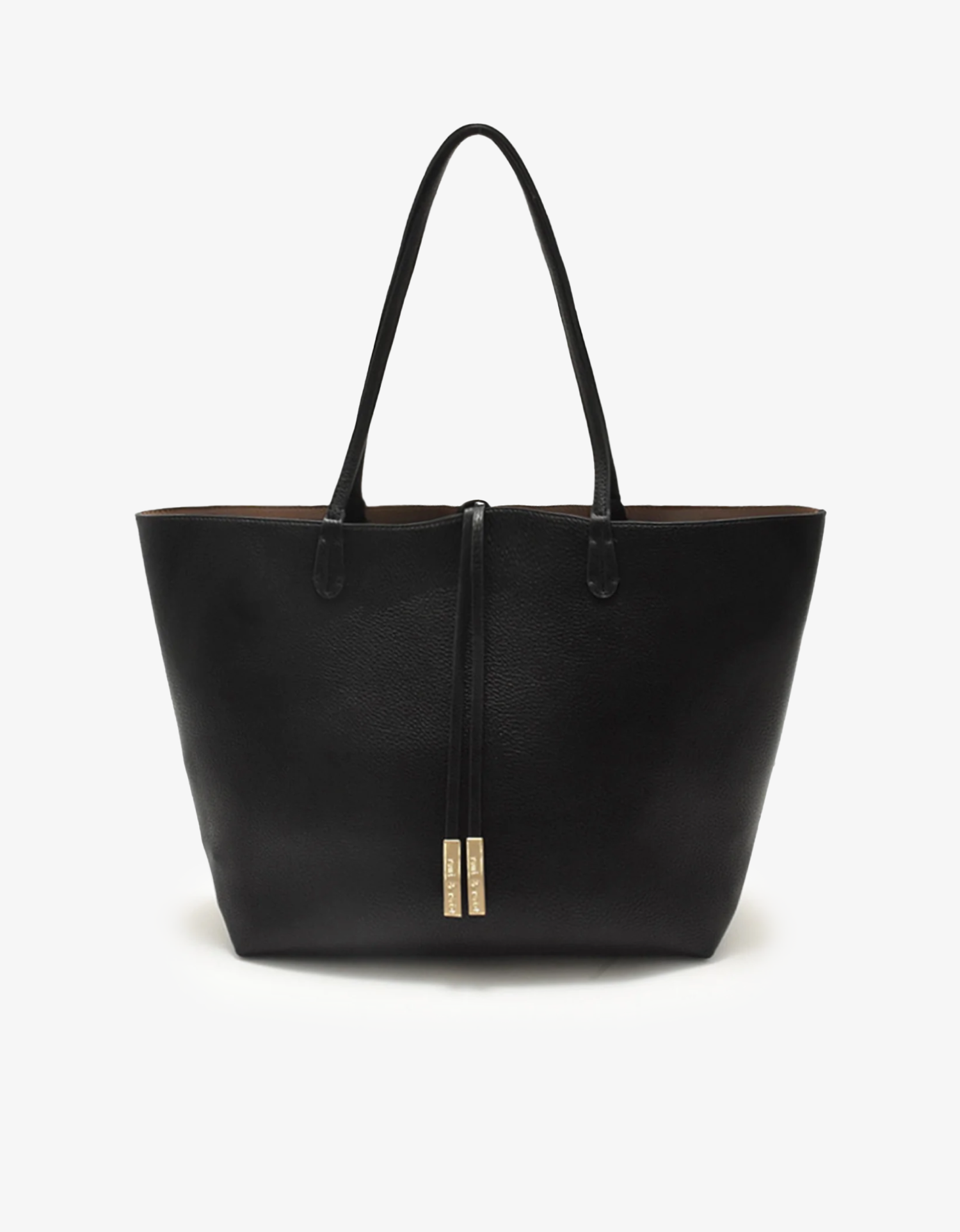 A black reversible tote handbag with a subtle aubergine hue at the bottom and a beige interior, displayed against a plain background.
