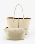 Spacious reversible Remi and Reid tote with cream and taupe colorway with matching zippered pouch