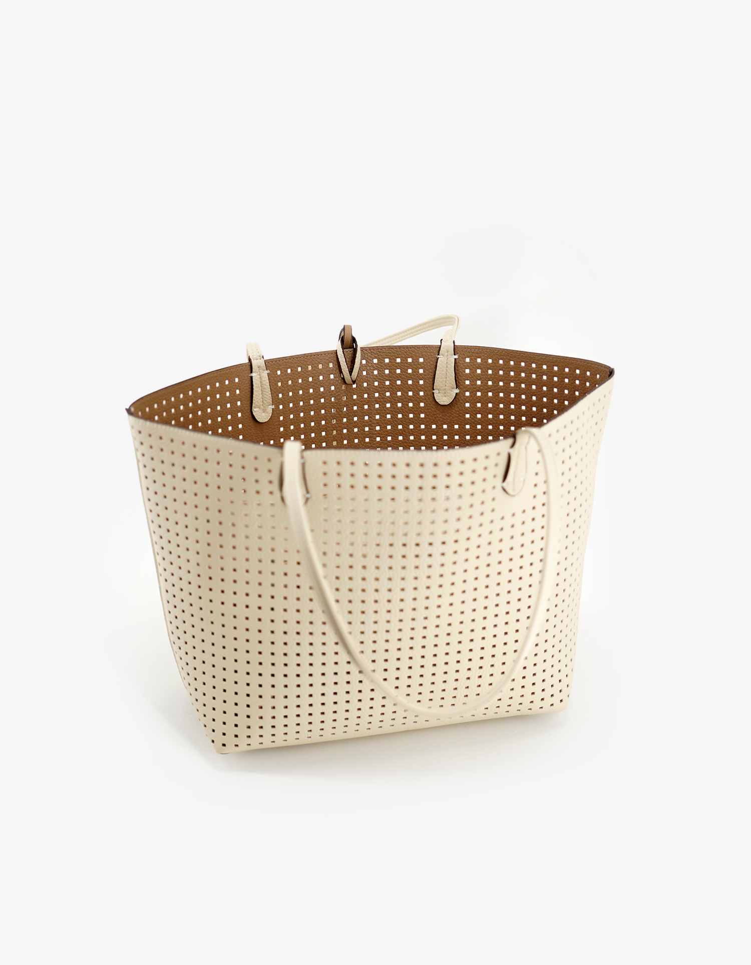 Remi and Reid two-in-one reversible vegan leather tote in cream and taupe colorway.