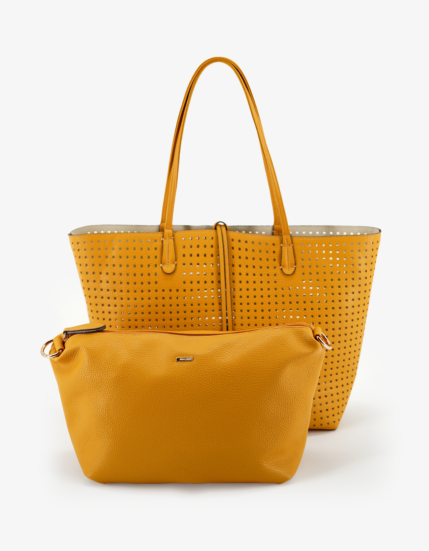 Remi and Reid Mustard yellow perforated vegan leather tote bag with a square laser-cut pattern.