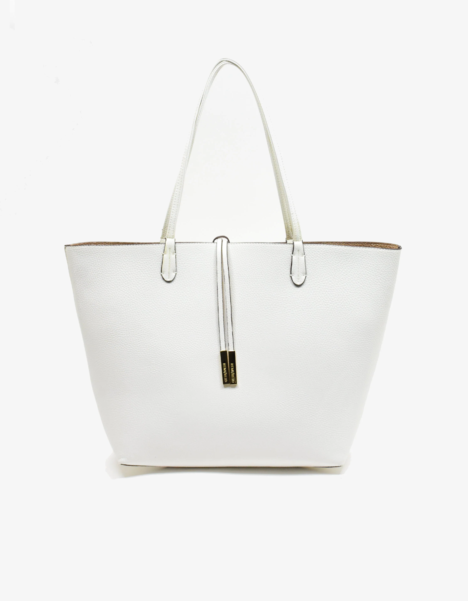 White and gold reversible Departure Tote handbag with a sleek design and a removable security pouch by Remi and Reid