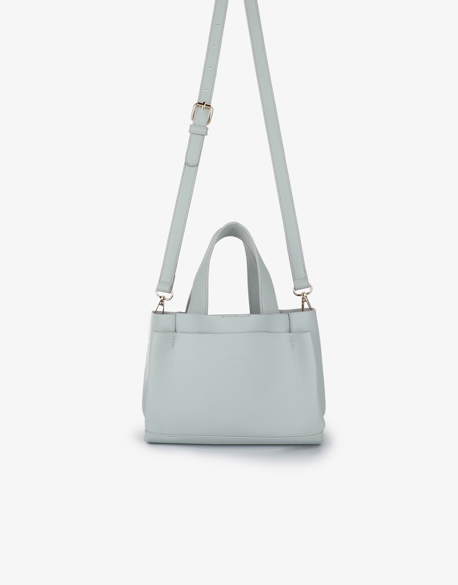 Light blue handbag with adjustable crossbody strap_Remi and Reid