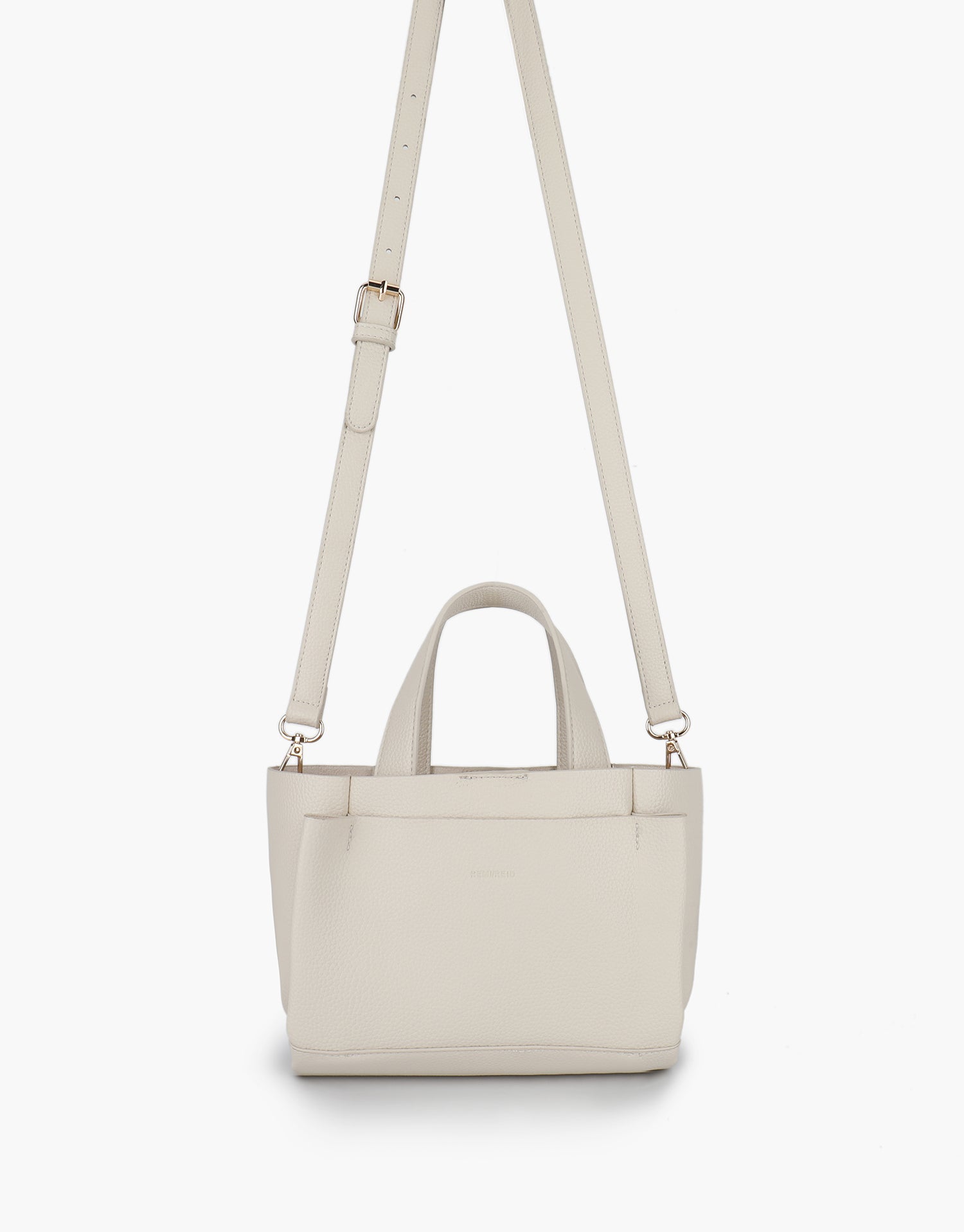 Beige handbag with a shoulder strap_Remi and Reid