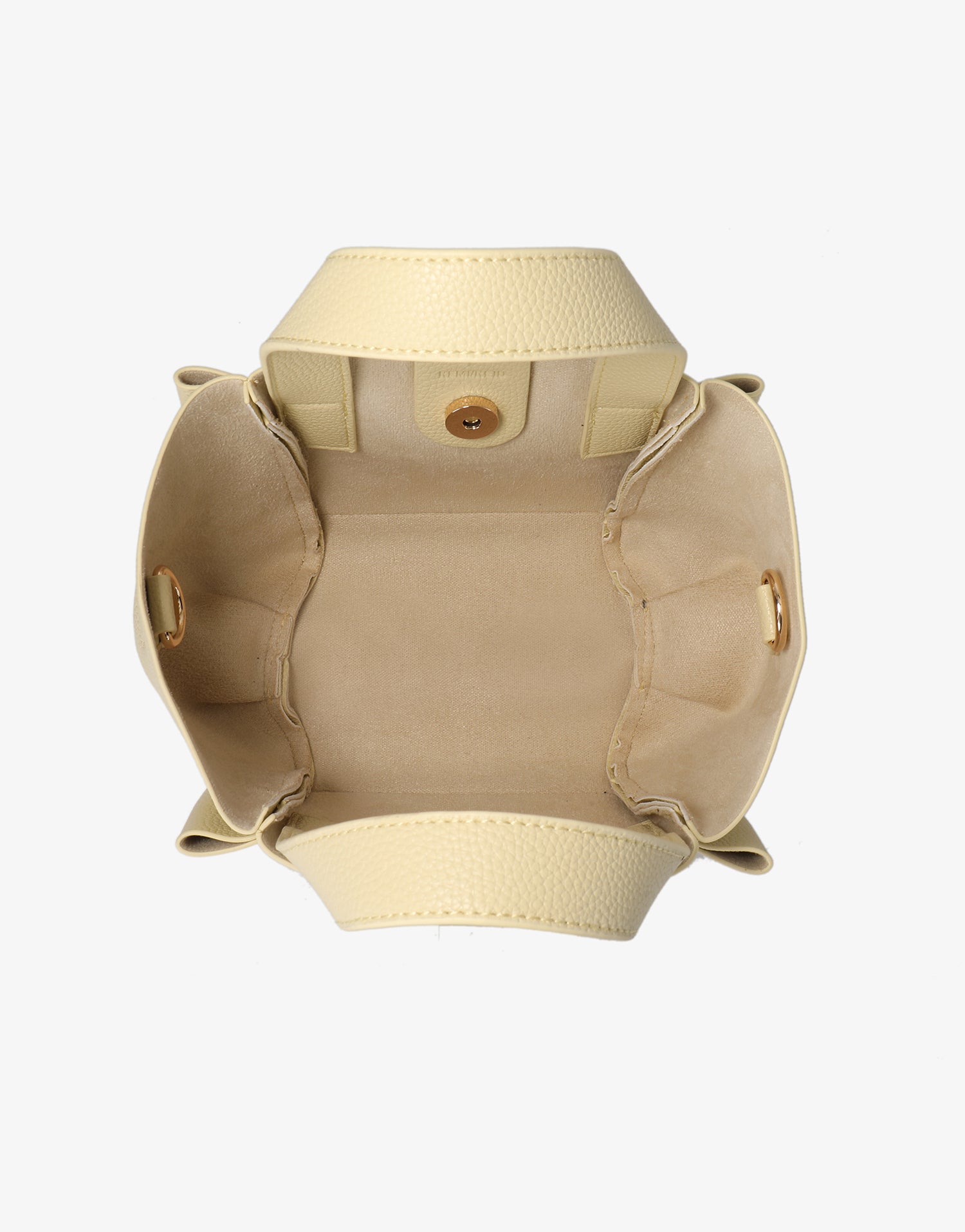 Spacious interior of mini yellow tote bag with magnetic clasps_Remi and Reid