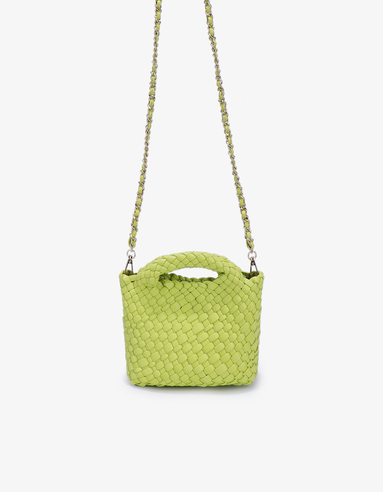 Mini woven tote in chartreuse green with chain crossbody strap by Remi and Reid.