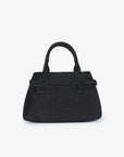 Black faux suede top-handle handbag with decorative belt detail_Remi and Reid