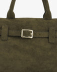 Close-up of olive green faux suede mini doctor bag with a belted buckle strap_Remi and Reid