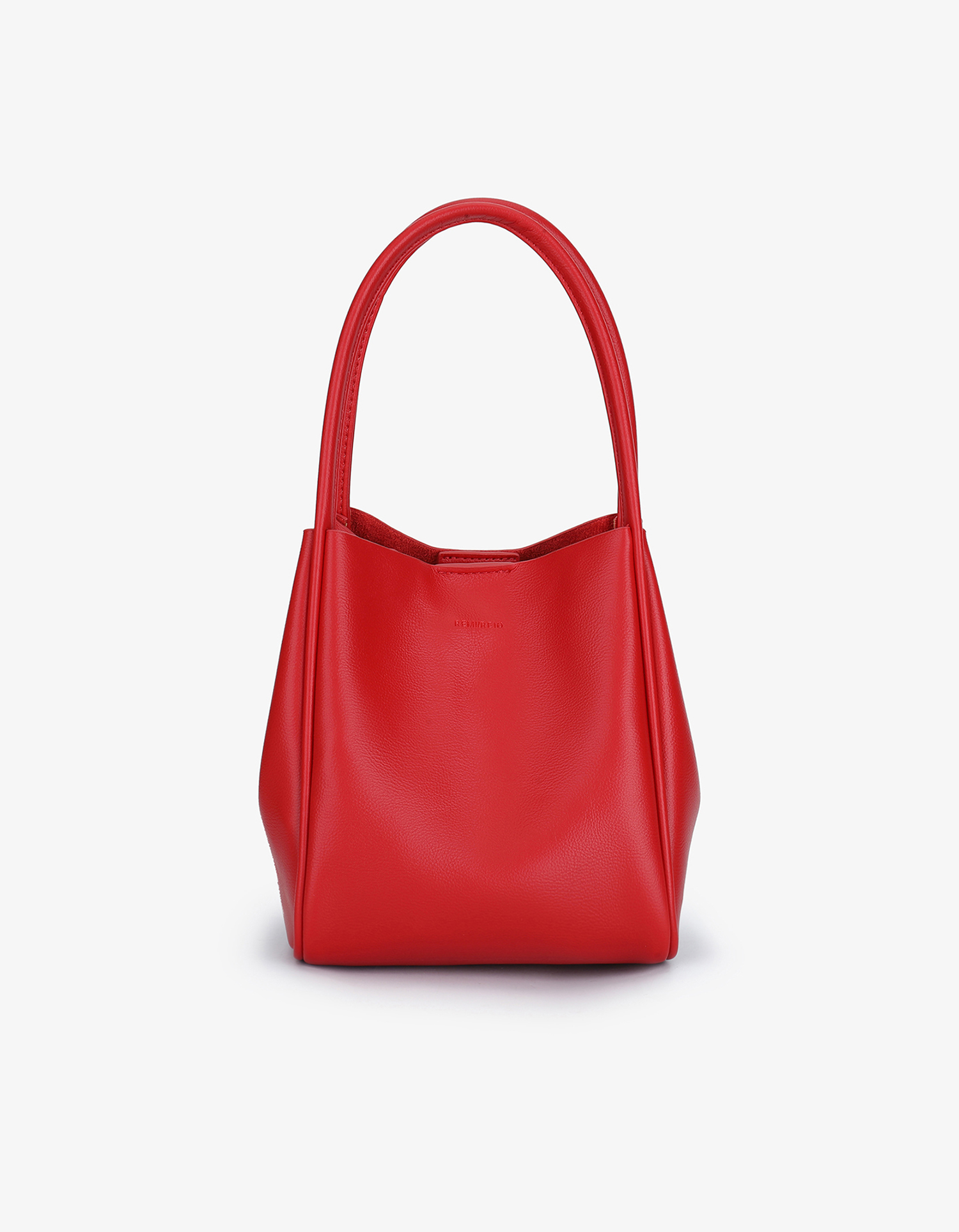 A red mini tote handbag with two handles and a detachable crossbody strap by Remi and Reid.