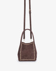 Brown faux suede handbag with body strap and studs design_Remi and Reid