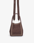 Brown faux suede handbag with shoulder strap and studded details_Remi and Reid