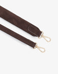 Close-up of brown faux suede strap with gold hardware_Remi and Reid