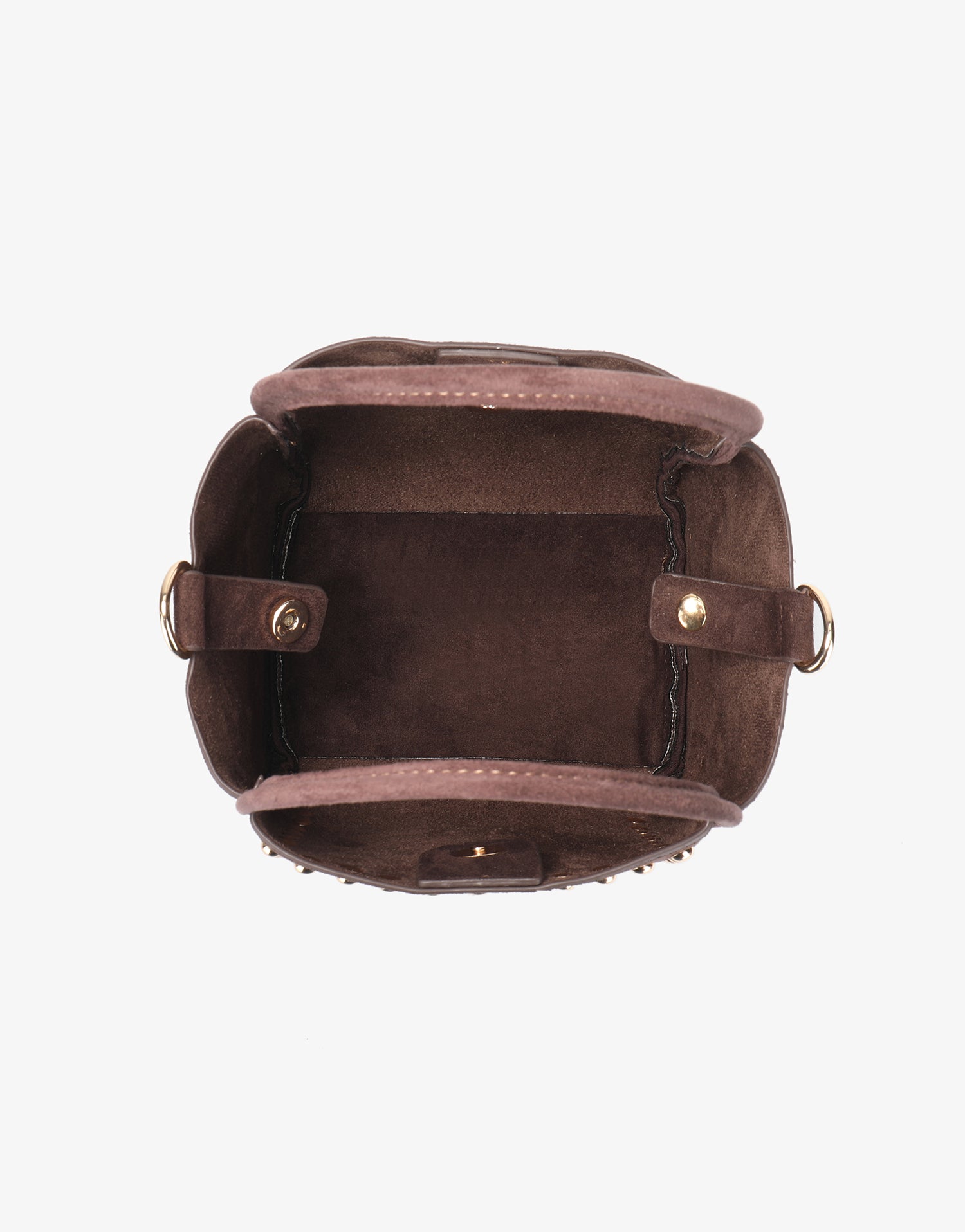Interior of brown mini bag with snap closure_Remi and Reid