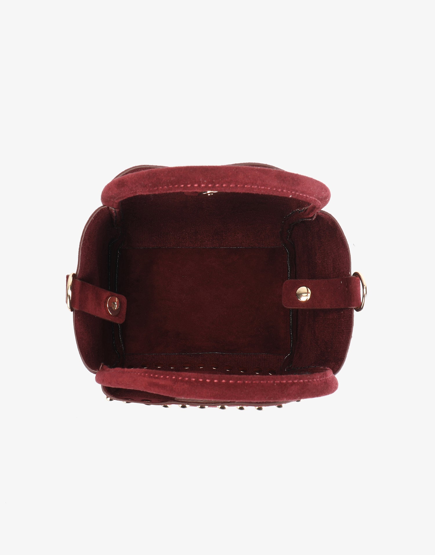 Spacious interior of faux suede handbag with snap closure_Remi and Reid
