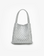 A shiny silver mini tote bag with a woven design, featuring two handles and a detachable crossbody strap by Remi and Reid.