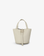 Joya cream-colored vegan leather bucket bag with a shoulder strap and a front buckle detail, by Remi and Reid