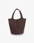 Brown faux suede bucket bag in back view_Remi and Reid
