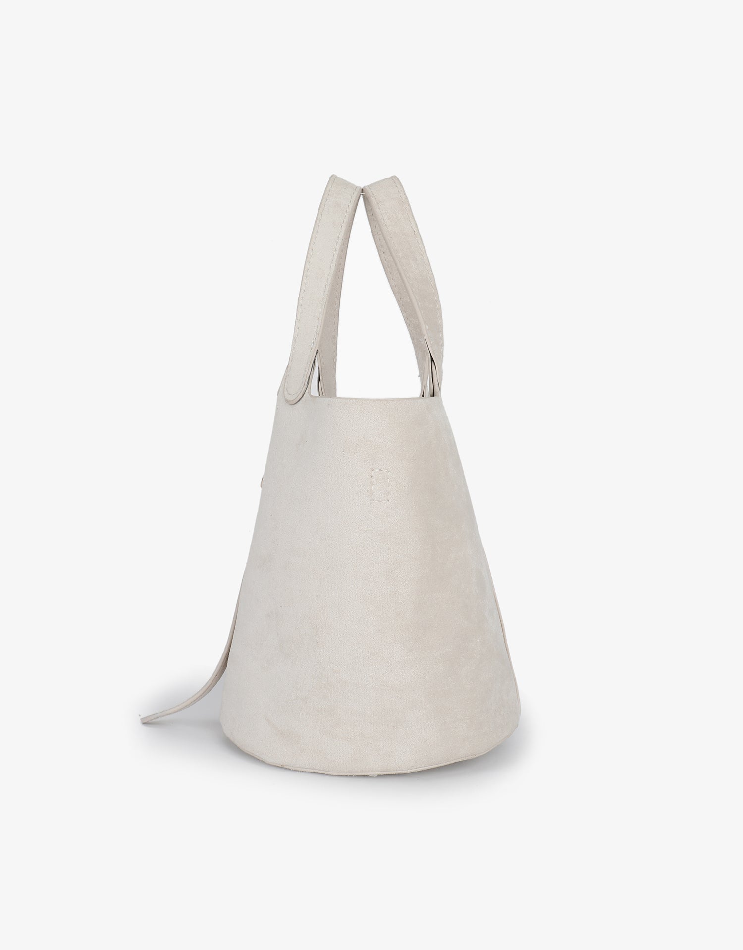 White bucket handbag in side view_Remi and Reid