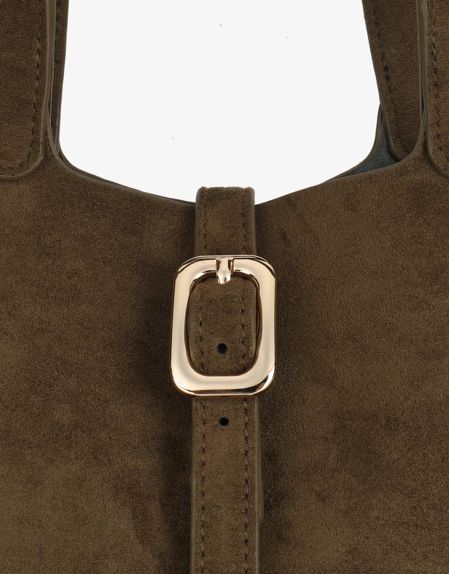 Close-up of a brown suede handbag with a gold buckle_Remi and Reid