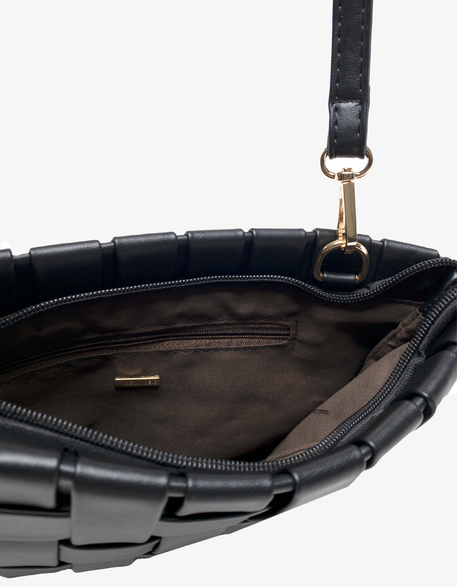 Close-up of Lindy interior with zippered pockets by Remi and Reid.