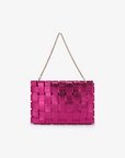 Metallic magenta clutch bag with removable chain strap by Remi and Reid.