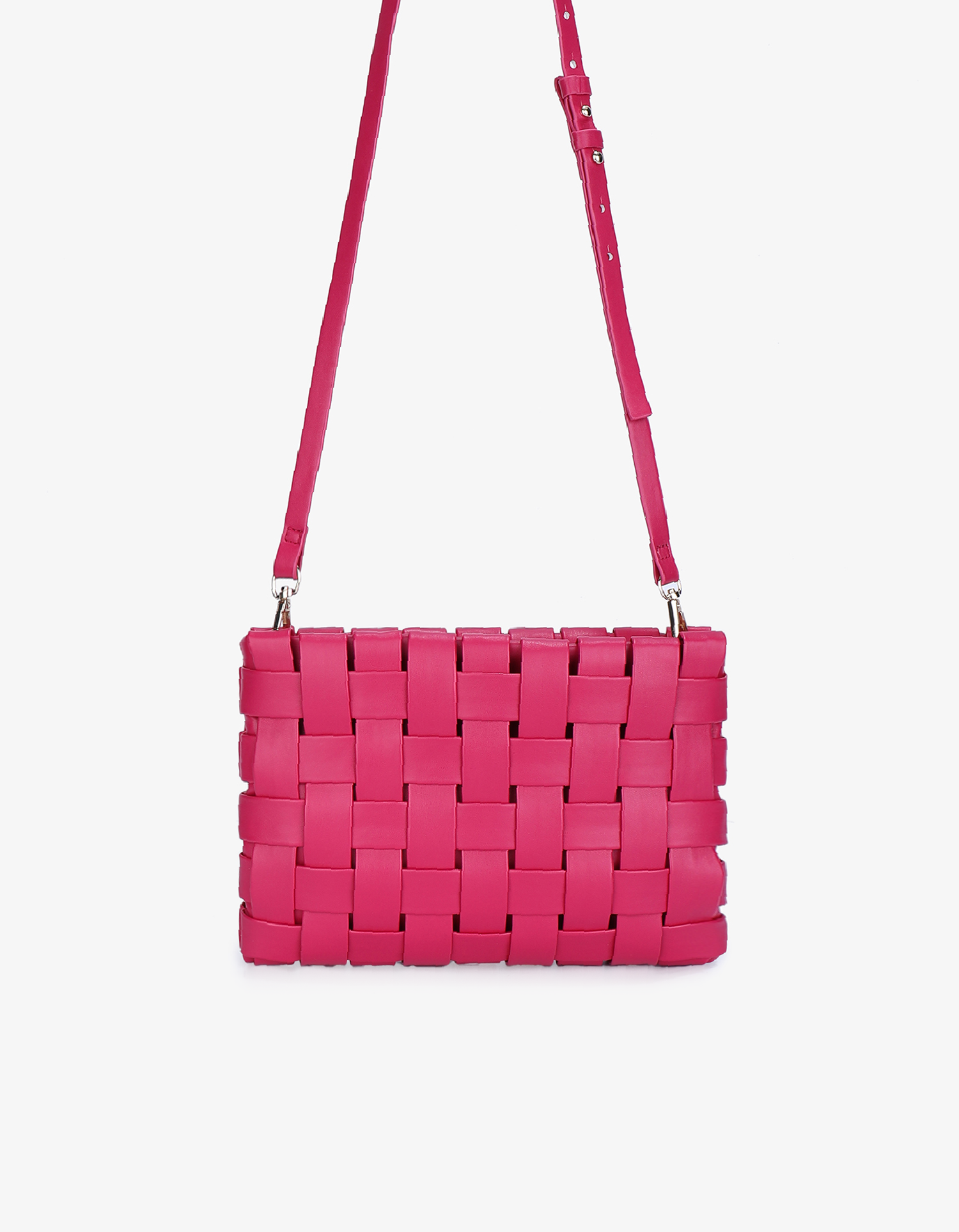 Pink woven handbag with a strap by Remi and Reid.