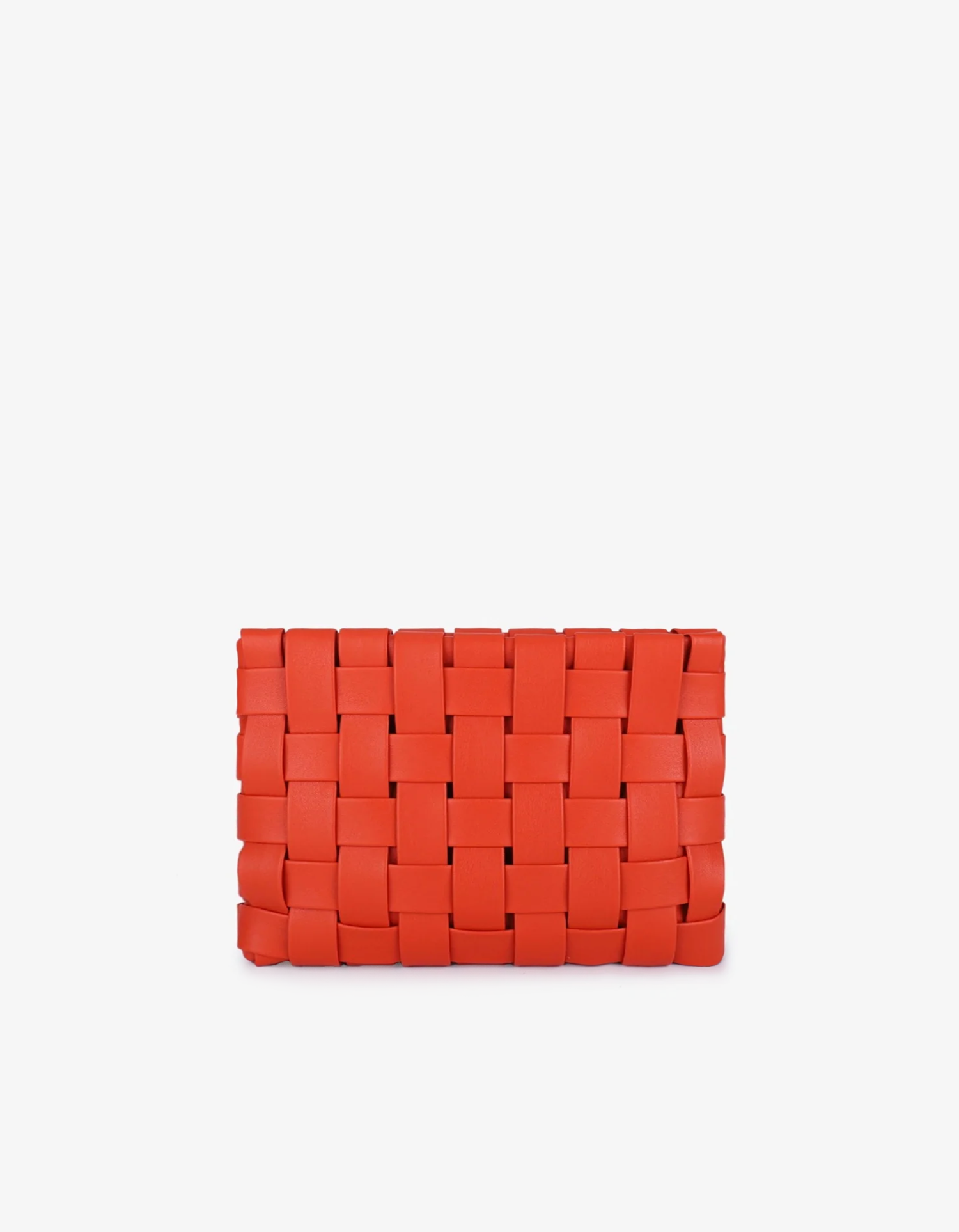 A large orange woven leather clutch with a structured shape and light gold hardware by Remi and Reid.
