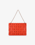 Orange woven handbag with a chain strap by Remi and Reid.