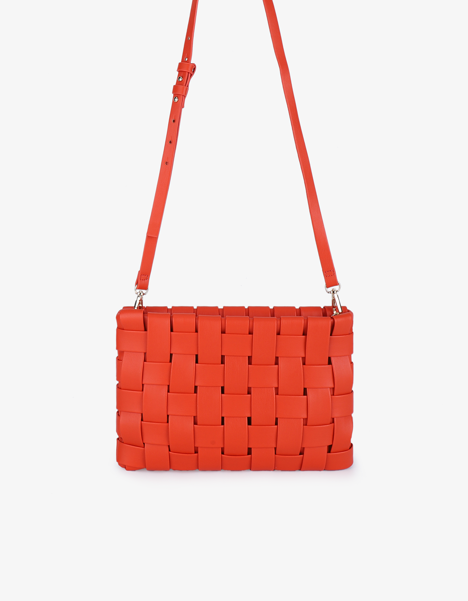 Orange woven handbag with adjustable crossbody and shoulder strap by Remi and Reid.