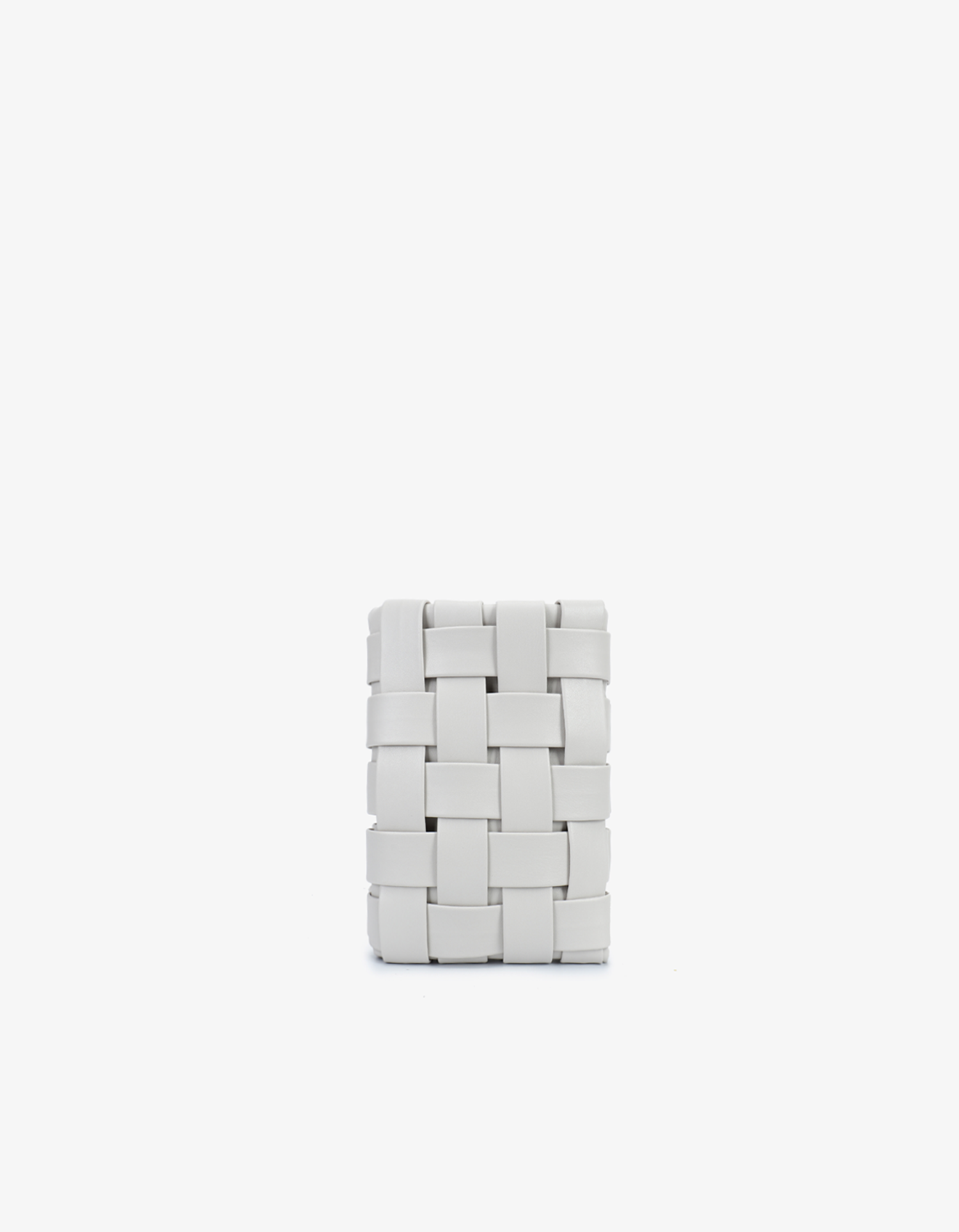 A woven white convertible cellphone pouch with a zip closure by Remi and Reid.