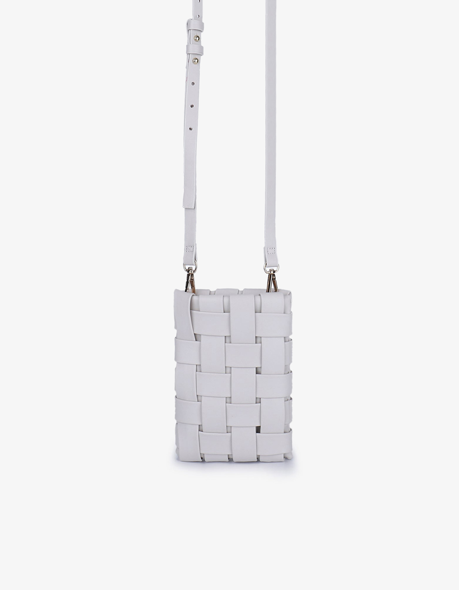 Lindy cellphone bag in off white by Remi and Reid with adjustable crossbody strap.