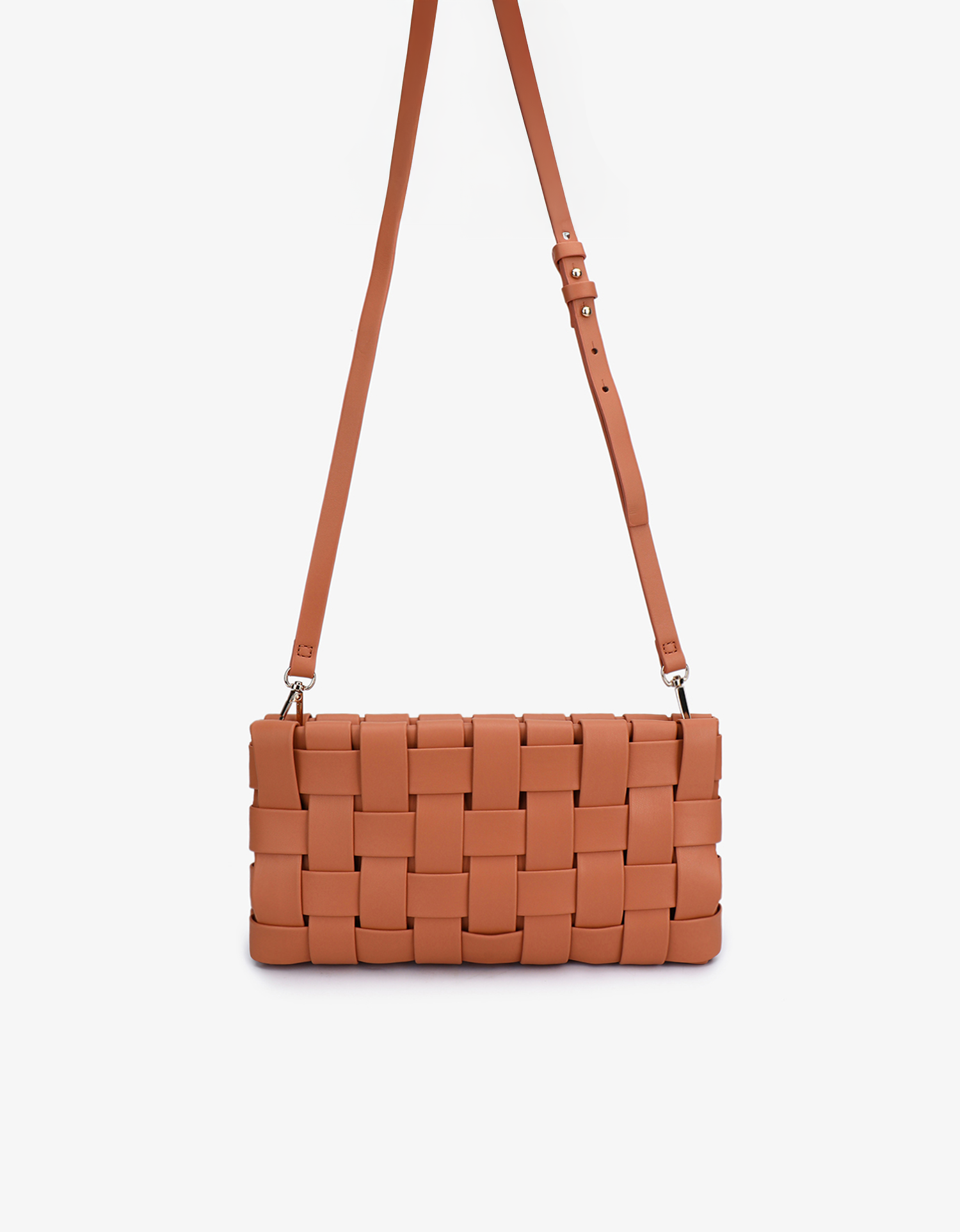Small woven Lindy clutch bag with a detachable body strap in apricot variation by Remi and Reid.