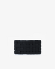 A small black woven clutch with a zipper closure by Remi and Reid.
