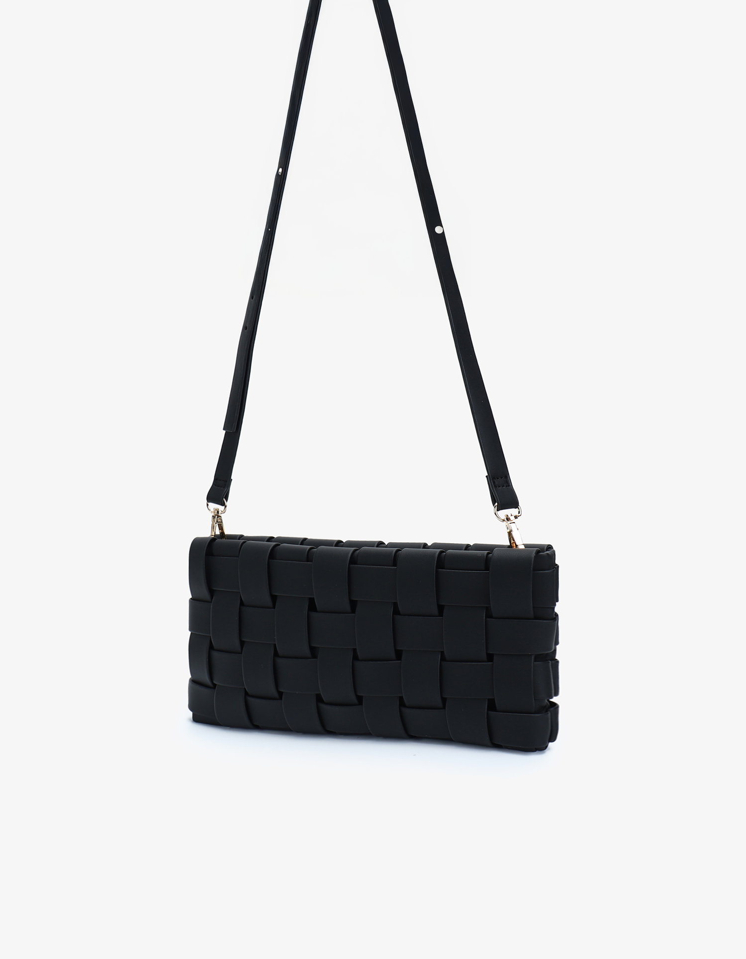 Small black woven clutch bag with adjustable crossbody strap by Remi and Reid.