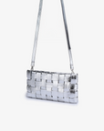Silver woven clutch bag with crossbody strap by Remi and Reid.