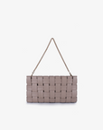 Woven handbag in light tan with removable chain strap by Remi and Reid.