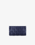 Navy blue woven vegan leather clutch with a solid pattern and a zipper closure by Remi and Reid.