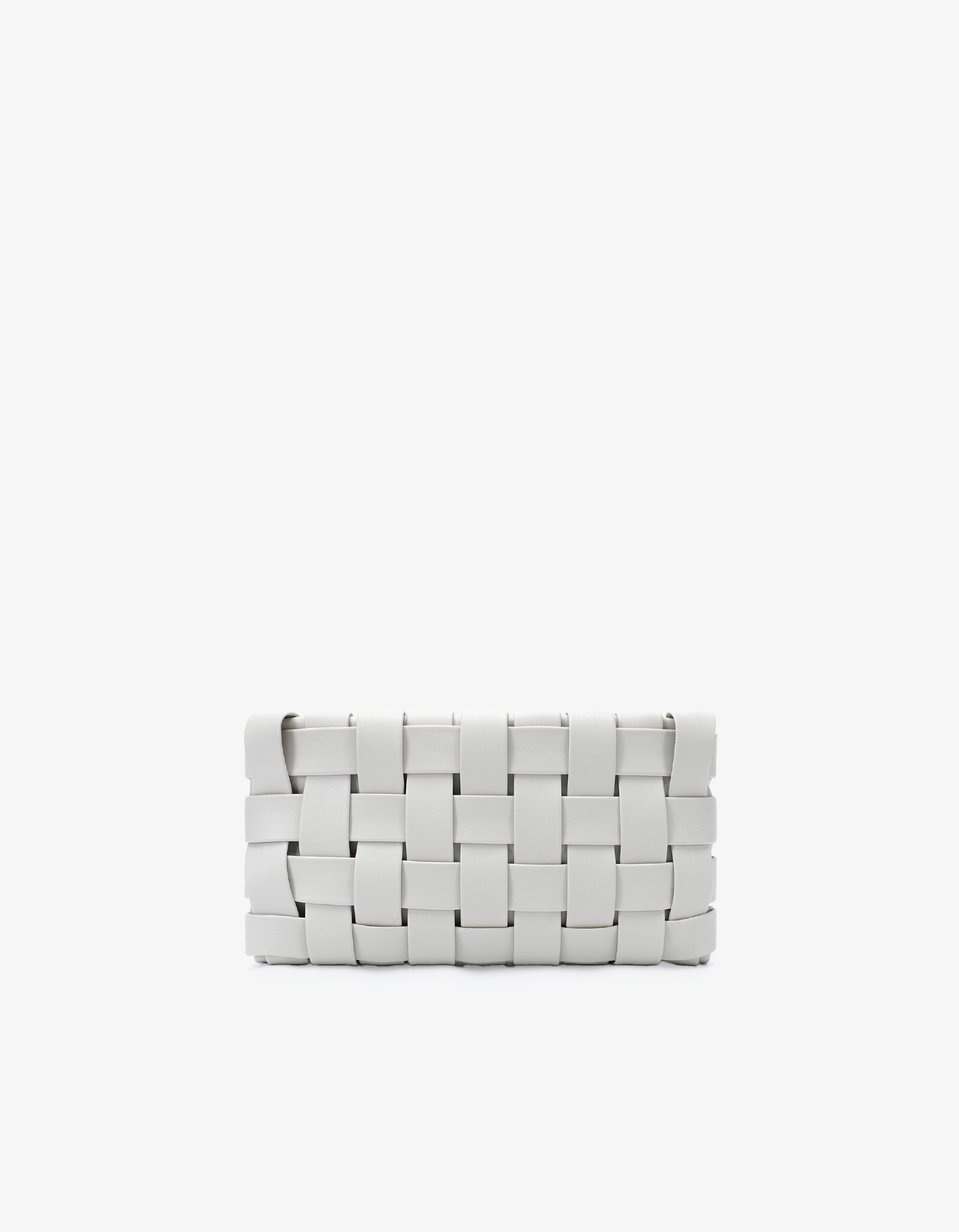 A woven off-white clutch with a zip closure by Remi and Reid.