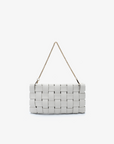 White woven handbag with a chain strap by Remi and Reid.
