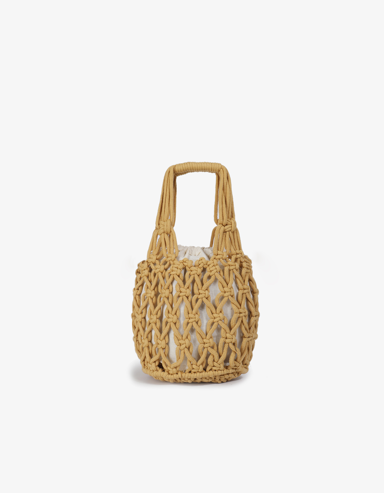 Beige crocheted handbag with a knotted marigold design and inner drawstring pouch by Remi and Reid.
