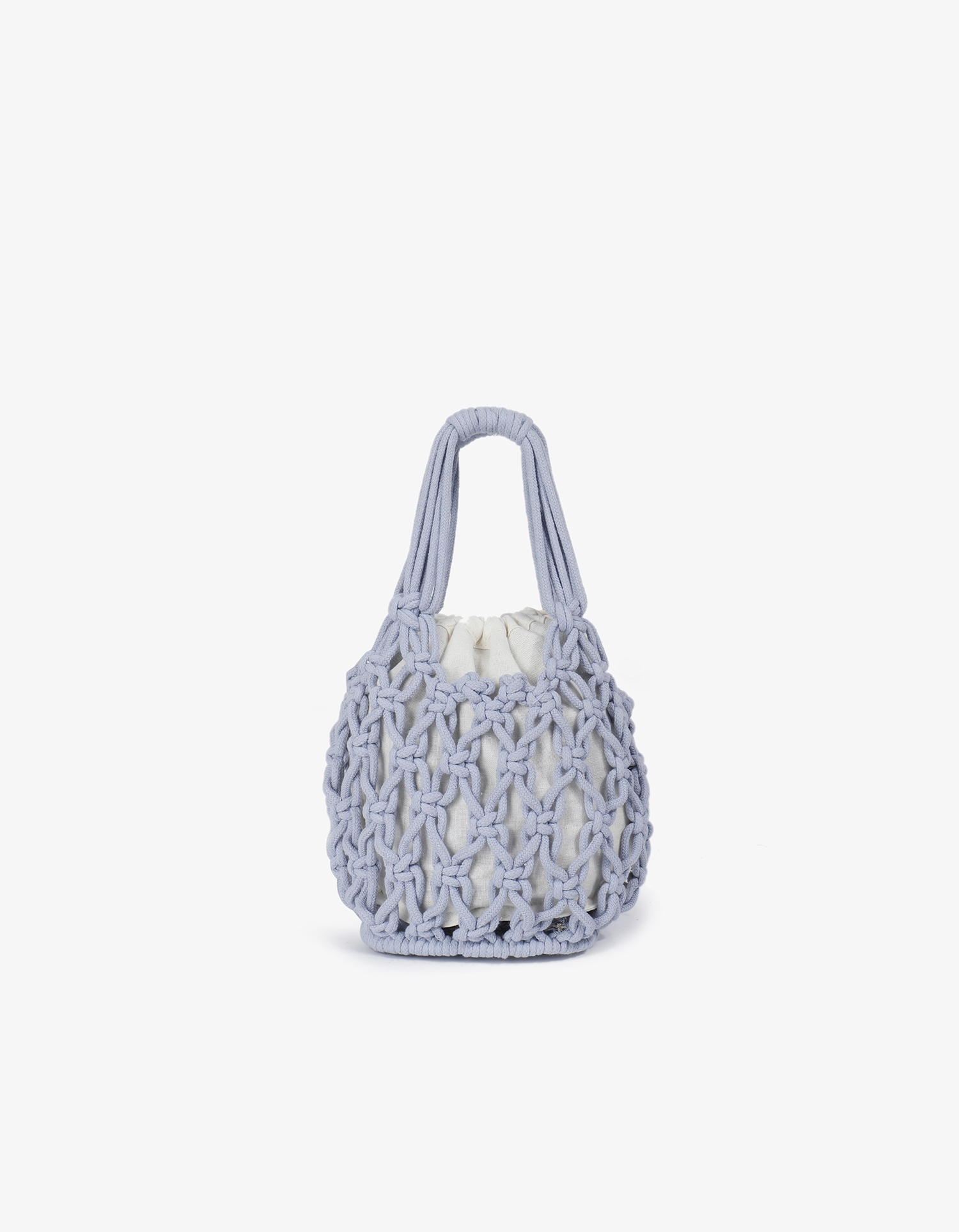 Bohemian-style small tote in periwinkle color with crocheted knotted  and open weave design featuring an inner drawstring pouch by Remi and Reid.