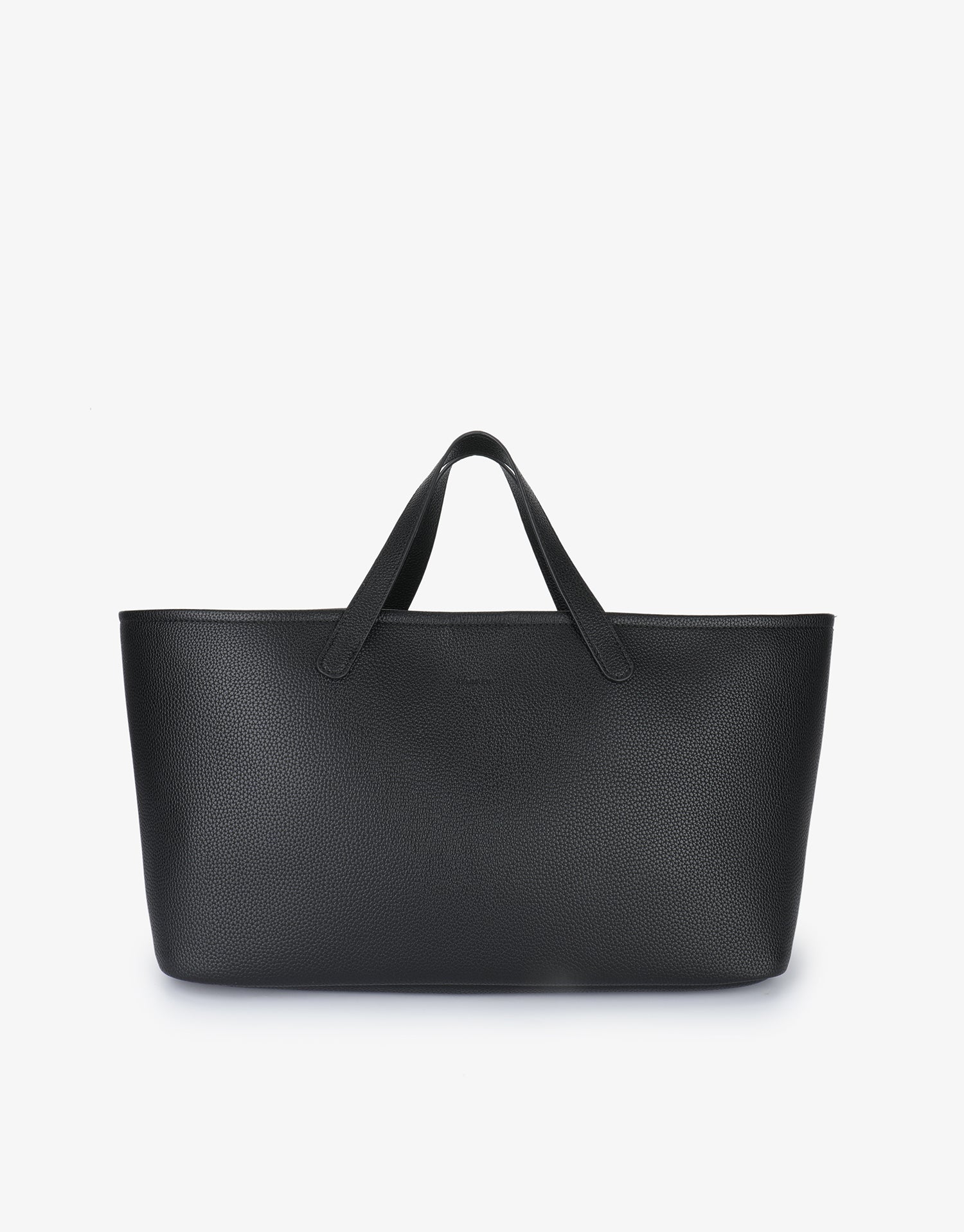 Remi and Reid Nala Tote East West Short in black pebbled vegan leather with a wide silhouette and short handles.