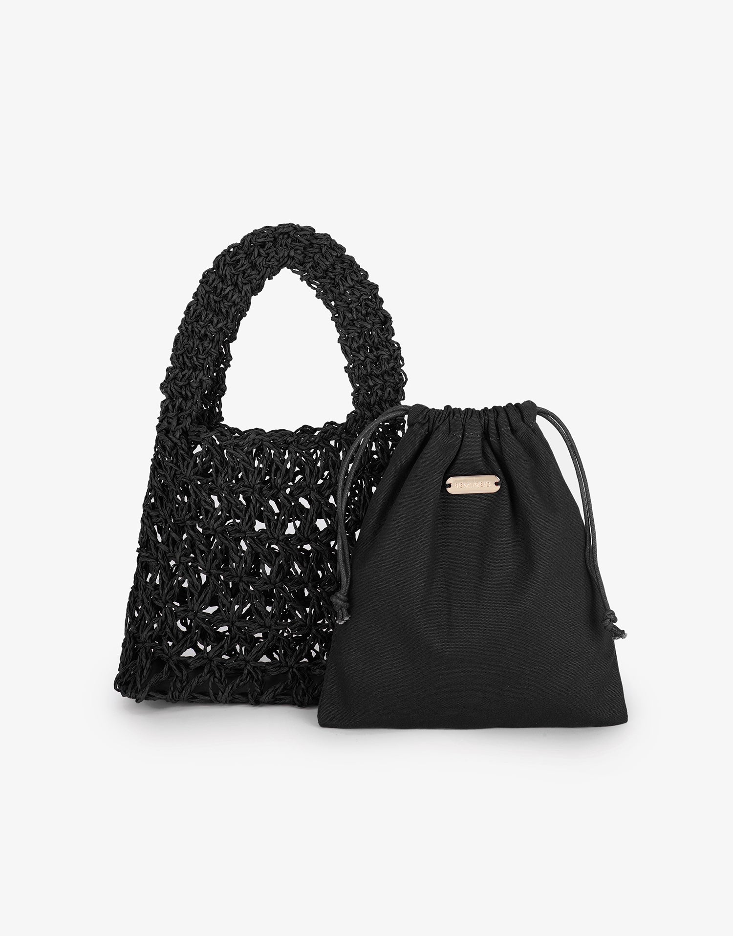 Open weave crochet Nigella Woven bag in black by Remi and Reid shown alongside its removable fabric liner pouch with a small gold logo plate.