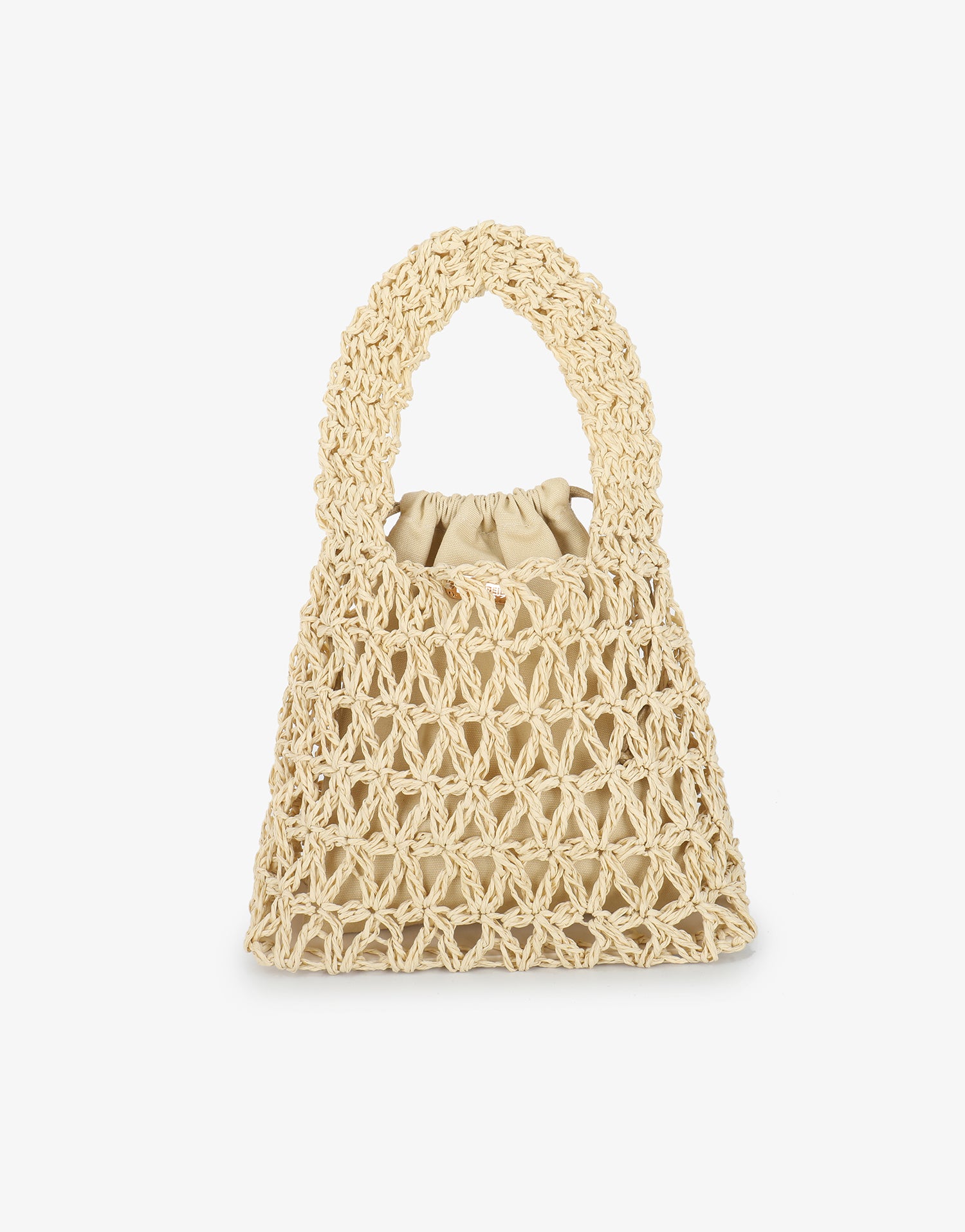 Nigella Woven bag by Remi and Reid in color beige shown from the front, highlighting its intricate open-knit texture and liner.