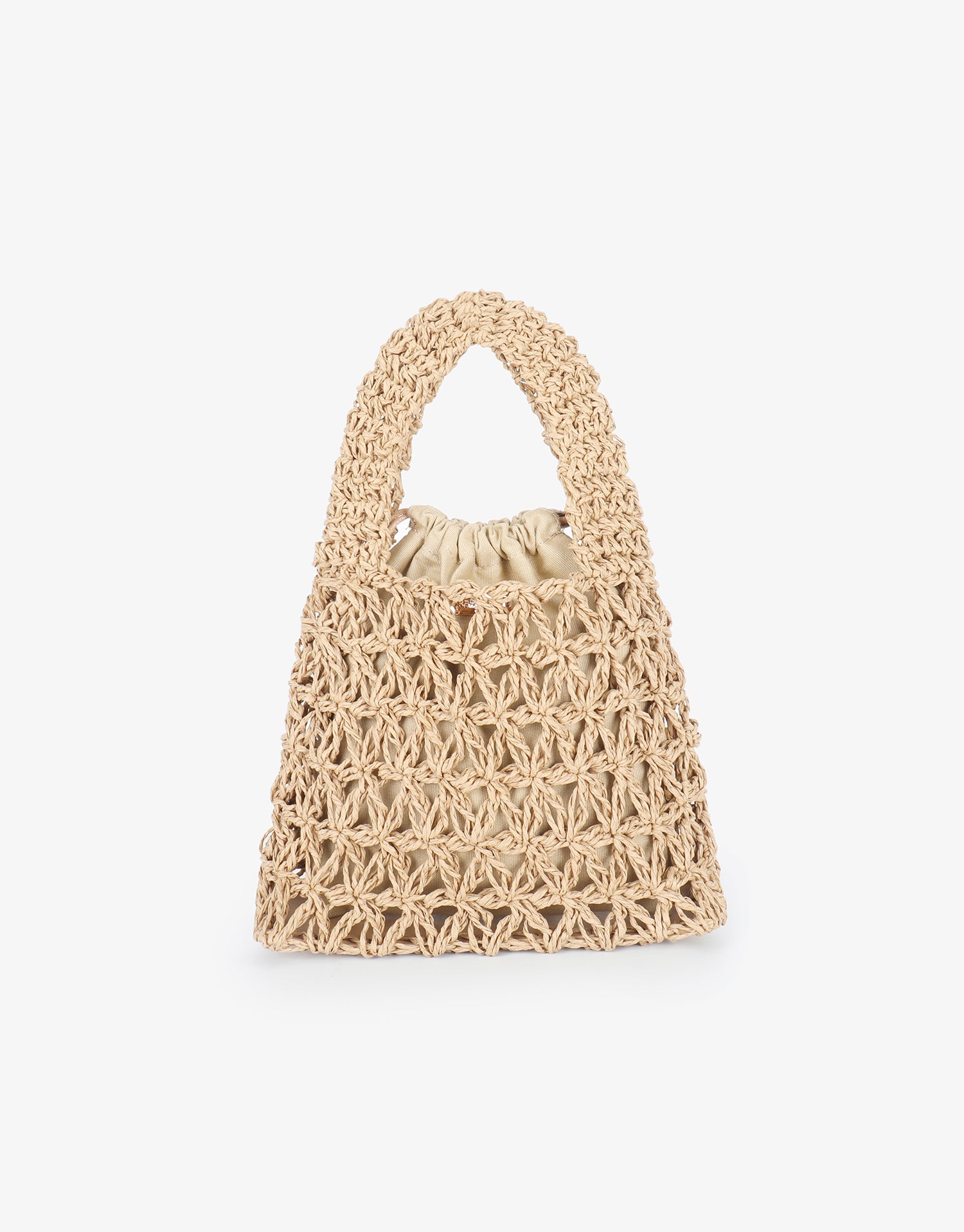 Open weave crochet bag with inner drawstring pouch by Remi and Reid.