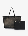 Black Oya Grommet Canvas Tote with a matching small zippered pouch by Remi and Reid.