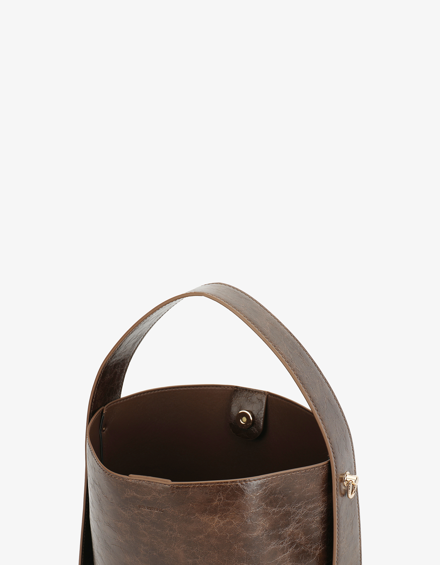 Paloma Waxed vegan leather shoulder bag in brown espresso featuring a wide single strap handle and gold-tone buckle hardware with magnetic snap closure inside by Remi and Reid.