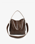 Paloma Waxed vegan leather shoulder bag in brown espresso featuring a wide single strap handle and gold-tone buckle hardware on the side with detachable adjustable strap by Remi and Reid.